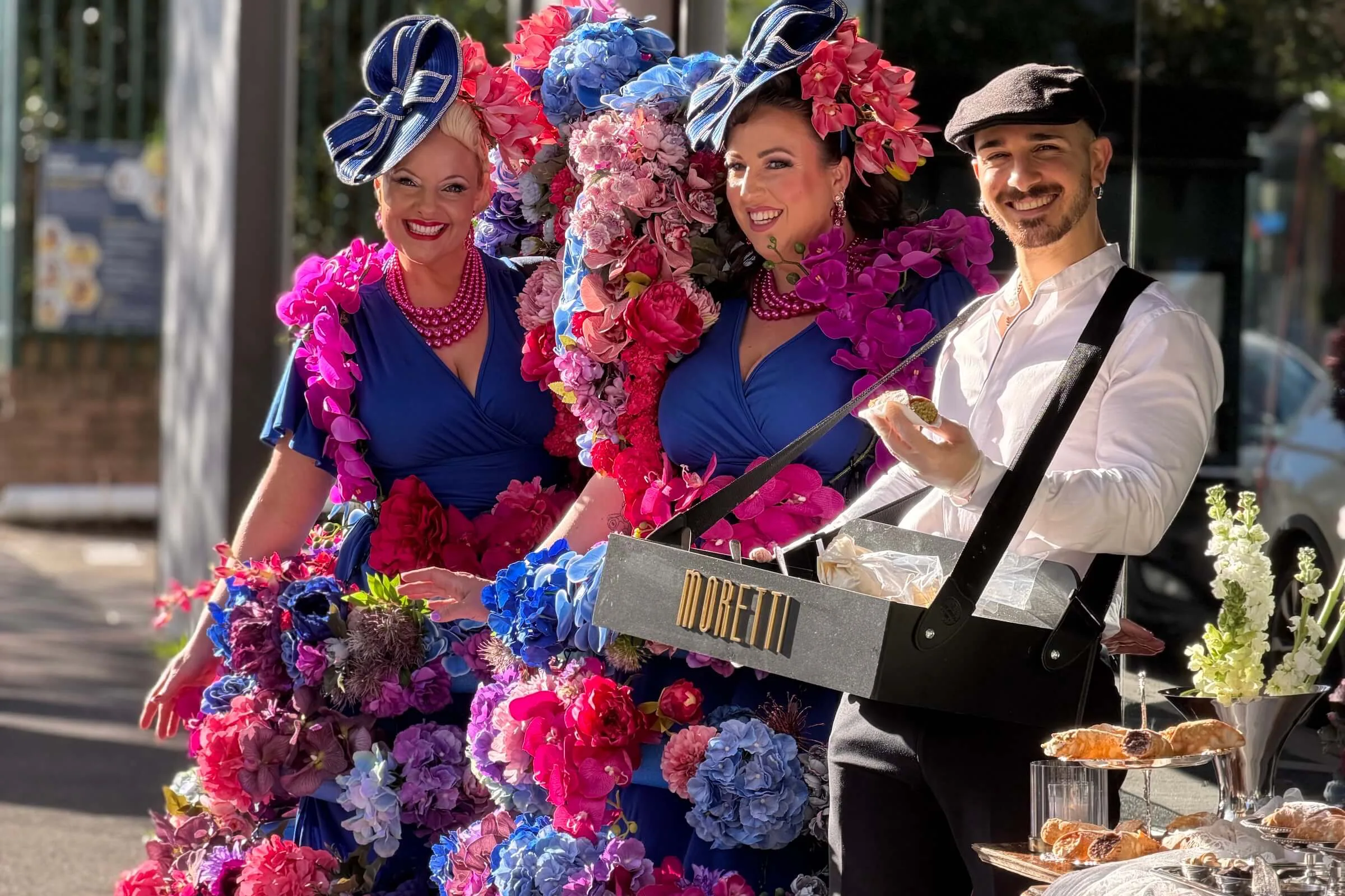 Live performers and floral entertainers engaging visitors during the Taste the Music Leichhardt precinct activation on Norton Street